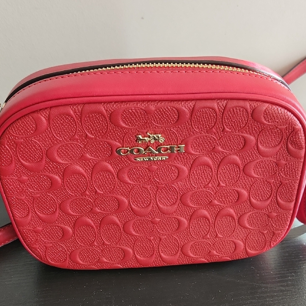 Coach Red Crossbody Bag with Embossed Pattern and Gold Hardware